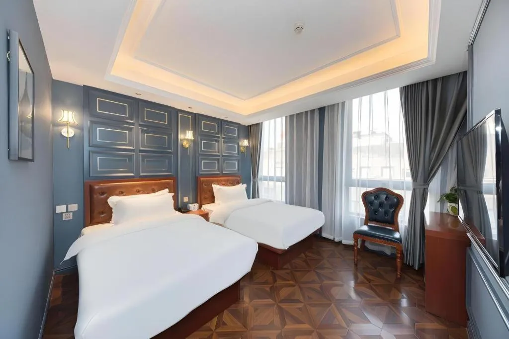 Bed in Yitingzhenshe Hotel Beijing Qianmen