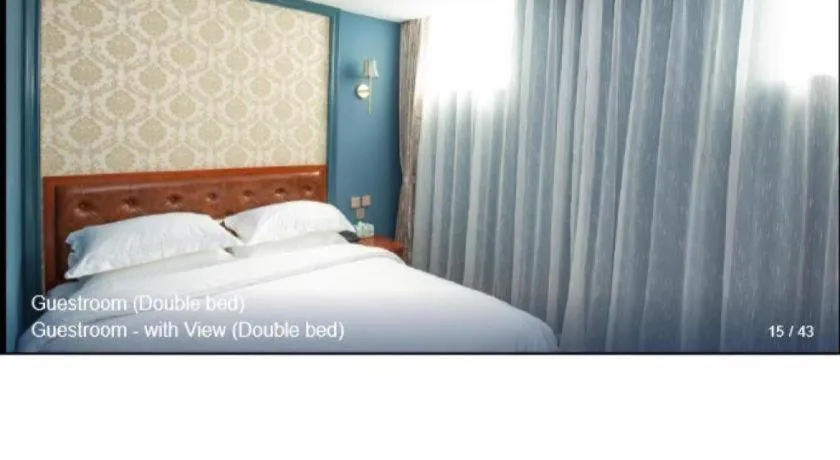 Bed in Yitingzhenshe Hotel Beijing Qianmen