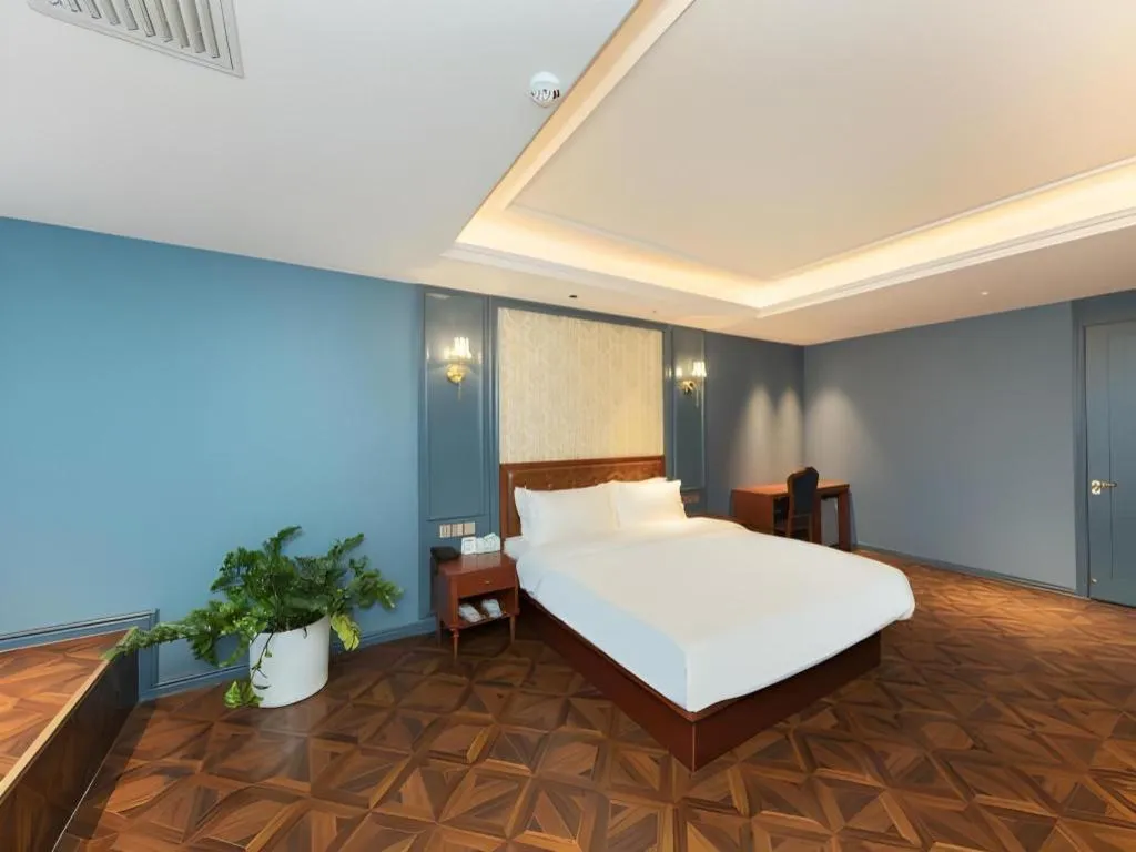 Bed in Yitingzhenshe Hotel Beijing Qianmen