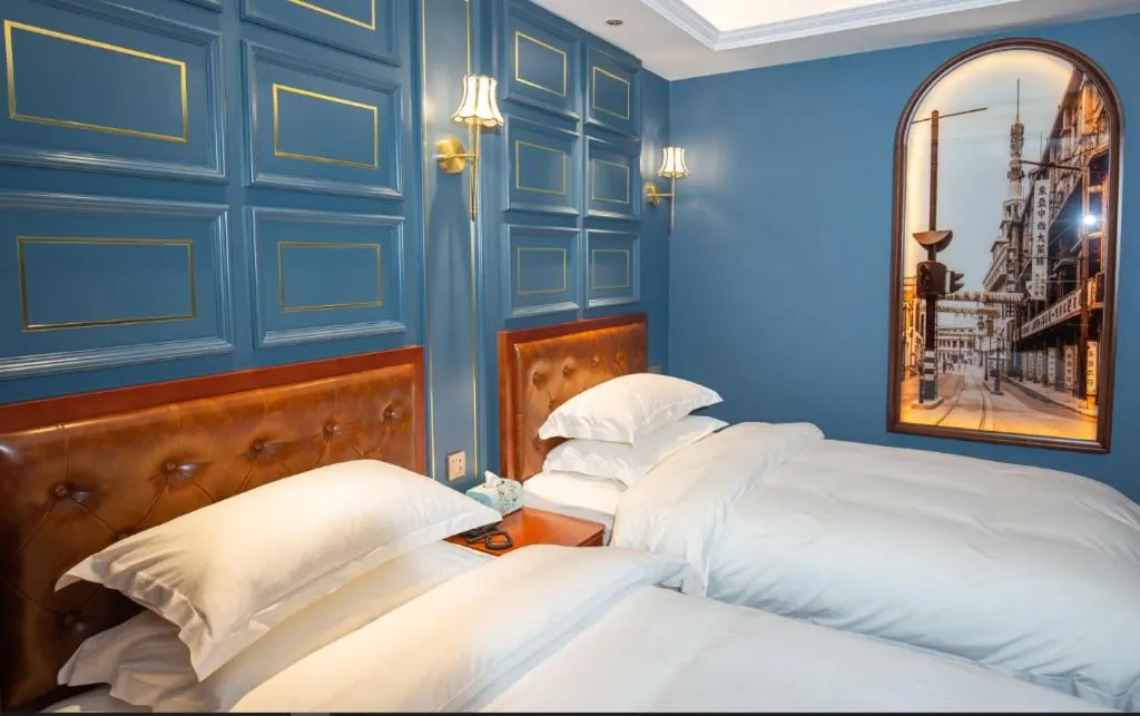 Bed in Yitingzhenshe Hotel Beijing Qianmen