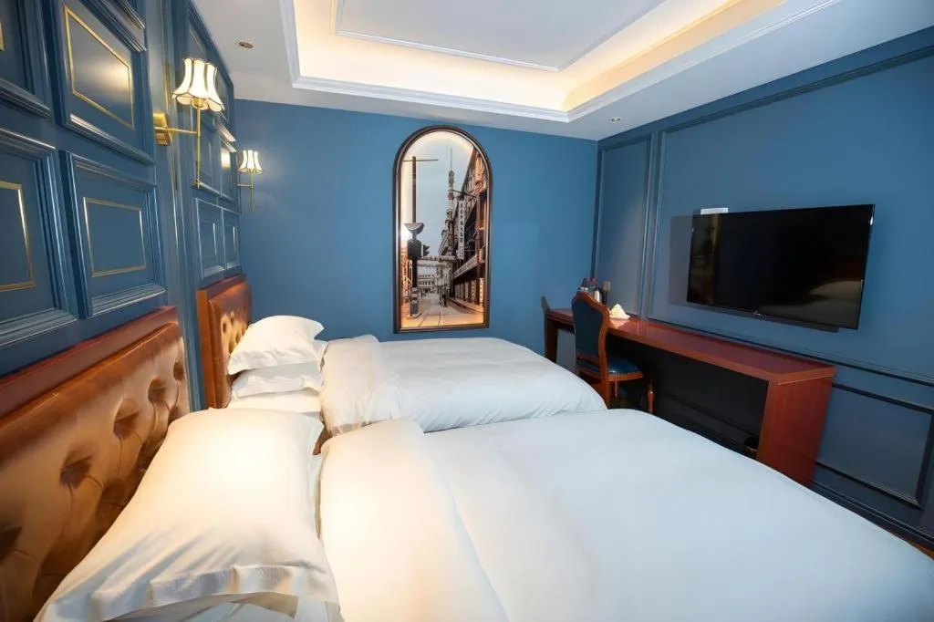 Bed in Yitingzhenshe Hotel Beijing Qianmen