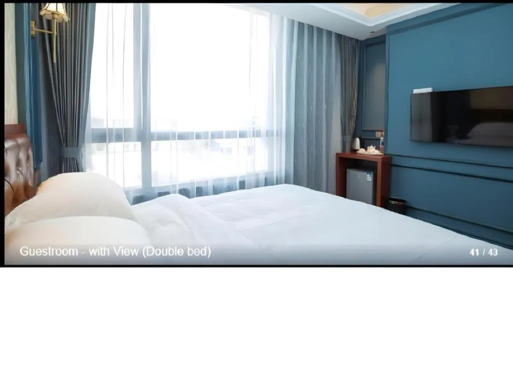 Bed in Yitingzhenshe Hotel Beijing Qianmen