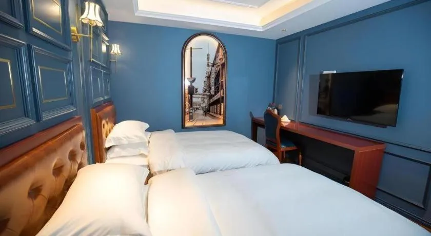 Bed in Yitingzhenshe Hotel Beijing Qianmen