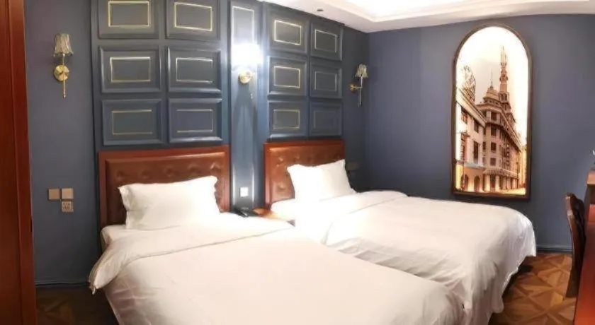 Bed in Yitingzhenshe Hotel Beijing Qianmen