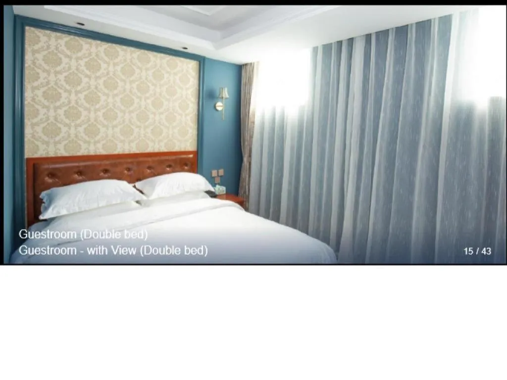 Bed in Yitingzhenshe Hotel Beijing Qianmen