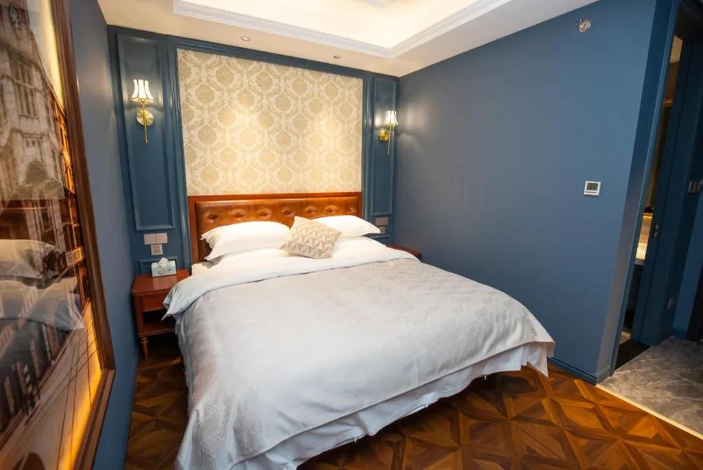 Bed in Yitingzhenshe Hotel Beijing Qianmen