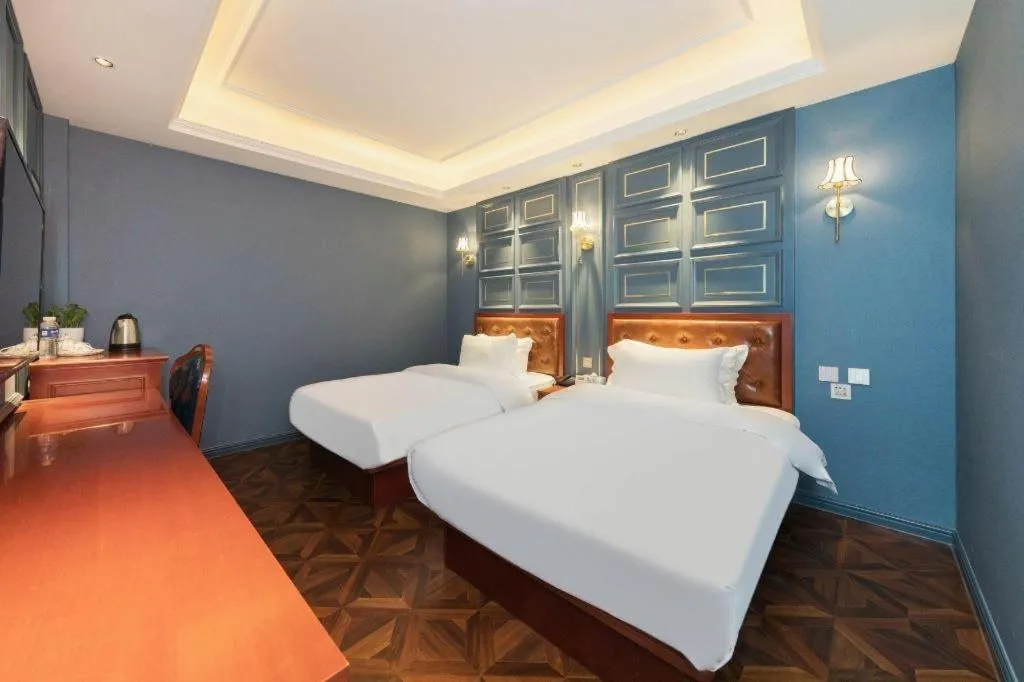 Bed in Yitingzhenshe Hotel Beijing Qianmen