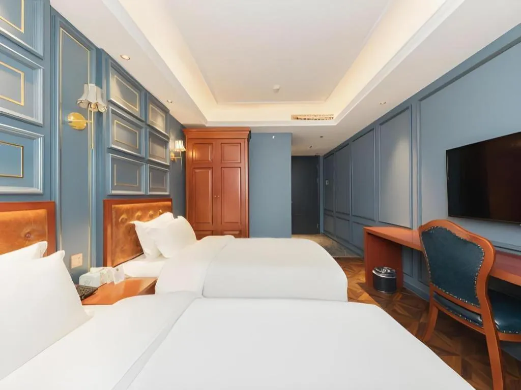 Bed in Yitingzhenshe Hotel Beijing Qianmen