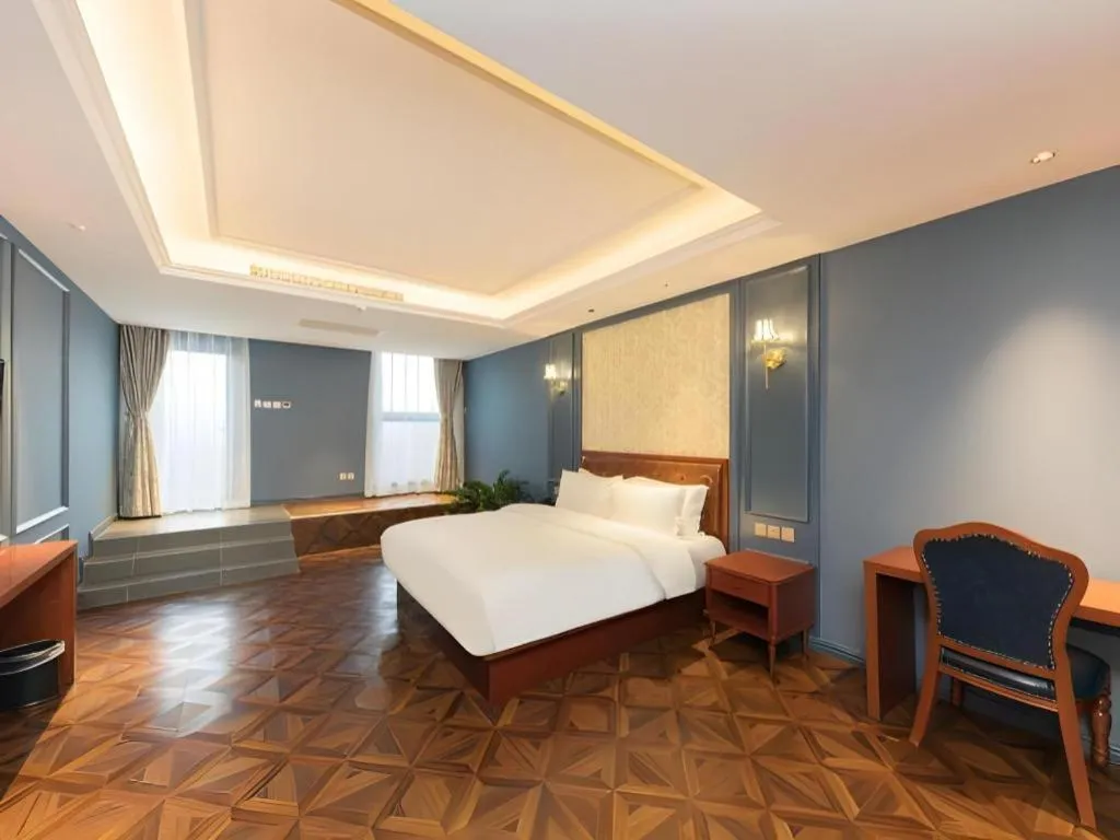 Bed in Yitingzhenshe Hotel Beijing Qianmen