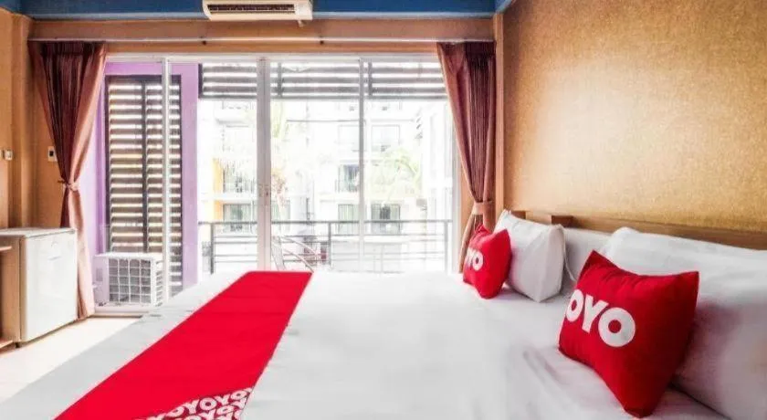 Bed in OYO 826 Cozy Rooms