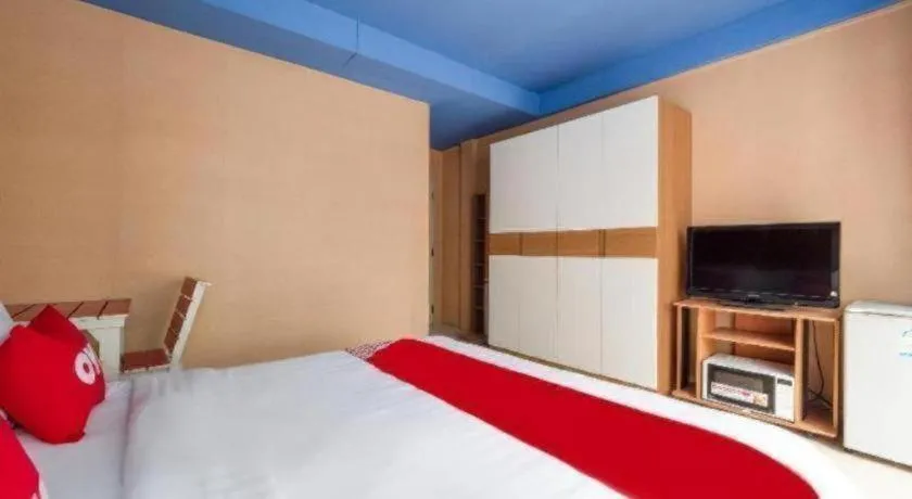 Bed in OYO 826 Cozy Rooms