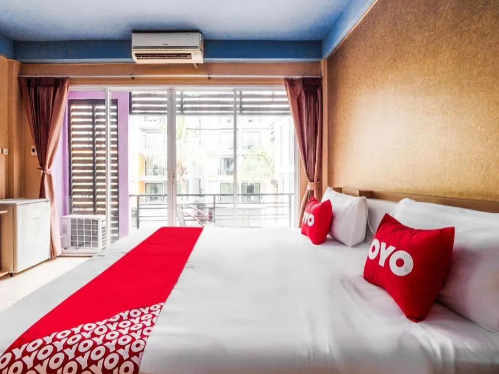 Bed in OYO 826 Cozy Rooms