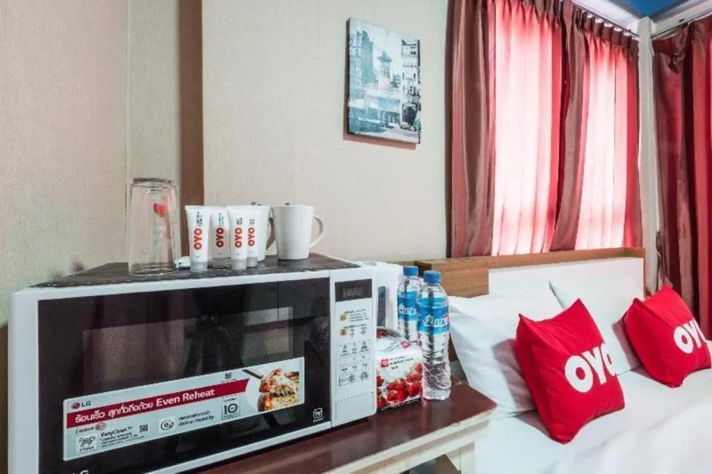 Bed in OYO 826 Cozy Rooms