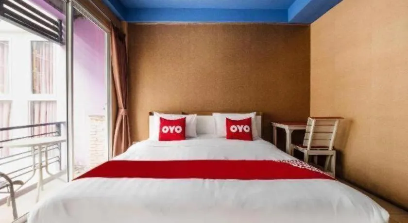 Bed in OYO 826 Cozy Rooms