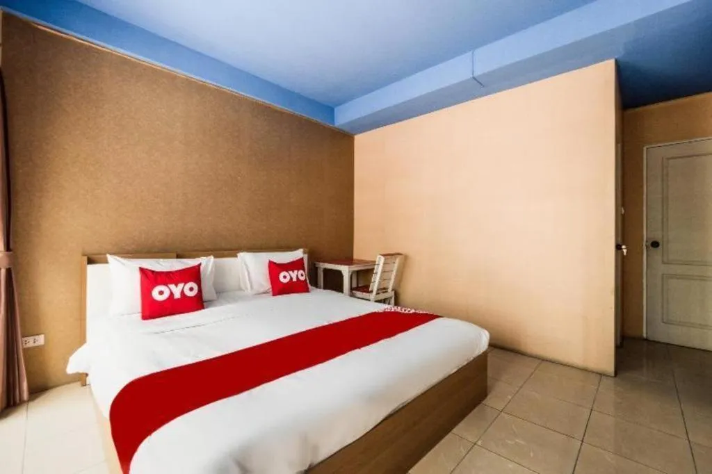 Bed in OYO 826 Cozy Rooms