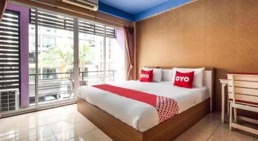 Bed in OYO 826 Cozy Rooms