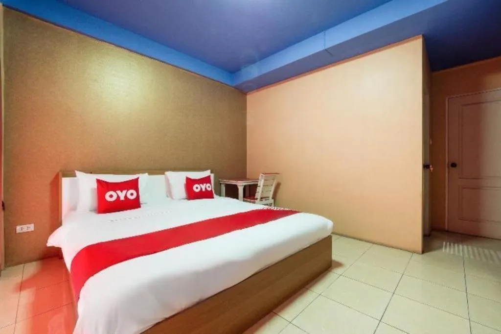 Bed in OYO 826 Cozy Rooms