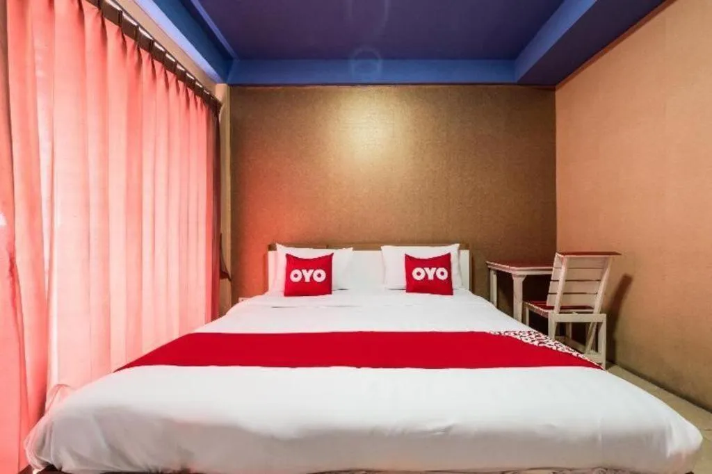 Bed in OYO 826 Cozy Rooms