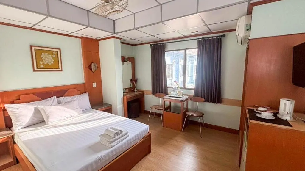 Bed in Sri Betong Hotel