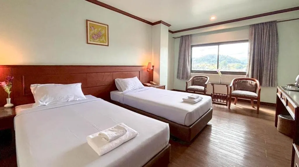 Bed in Sri Betong Hotel