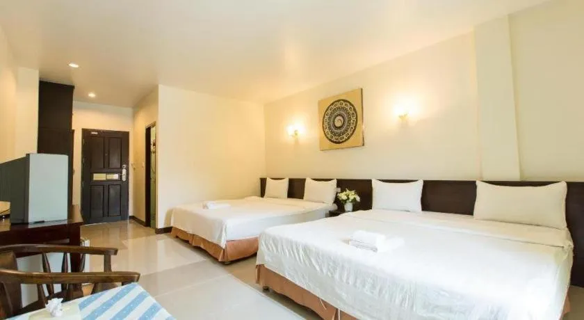 Bed in Kiang Talay Resort