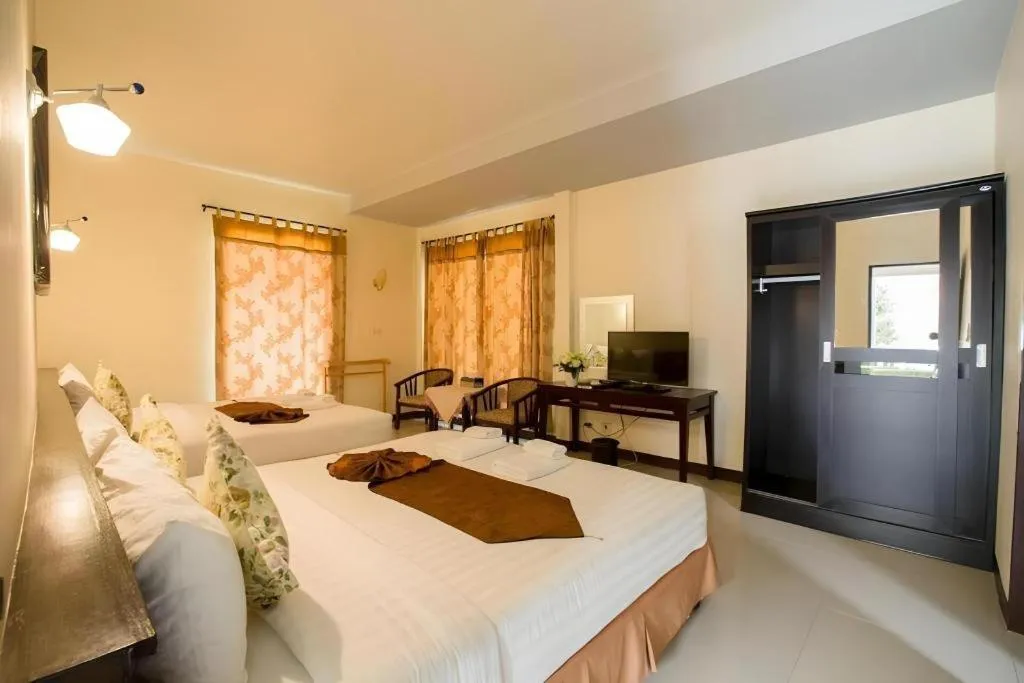 Bed in Kiang Talay Resort