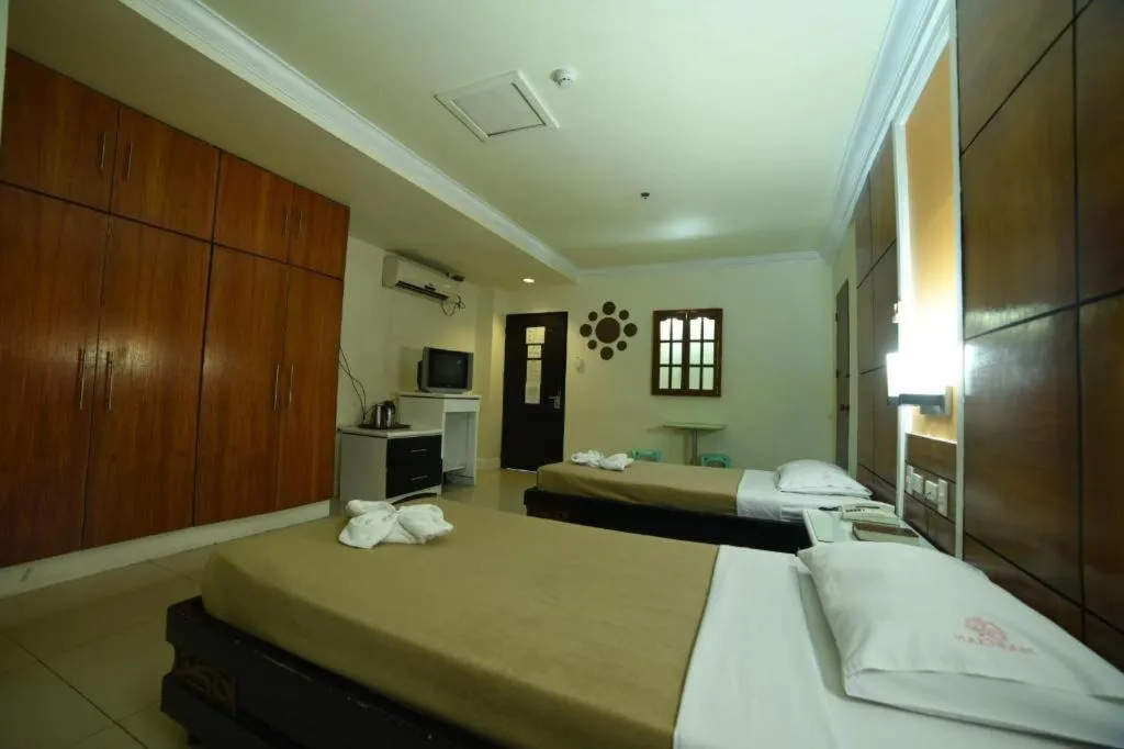 Bed in Marcian Business Hotel