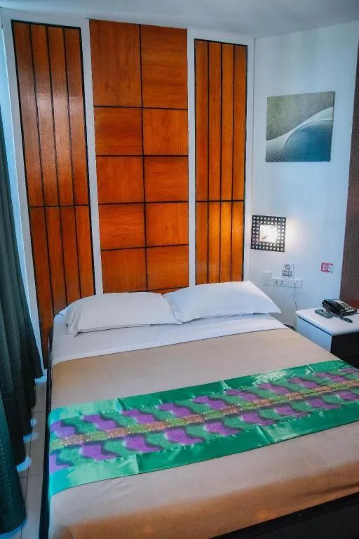 Bed in Marcian Business Hotel