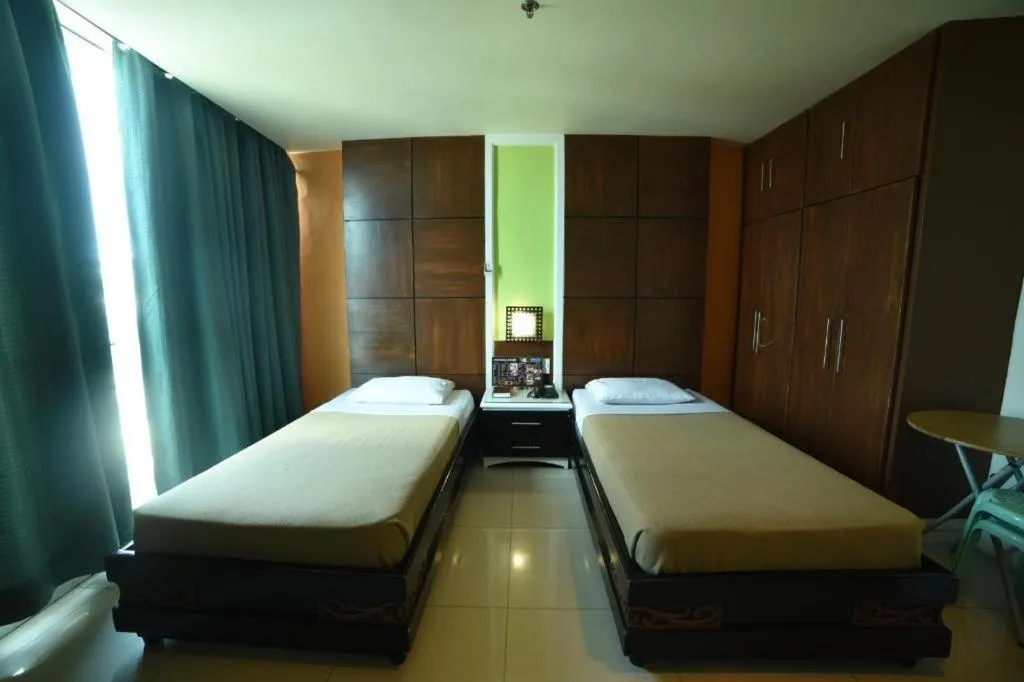 Bed in Marcian Business Hotel