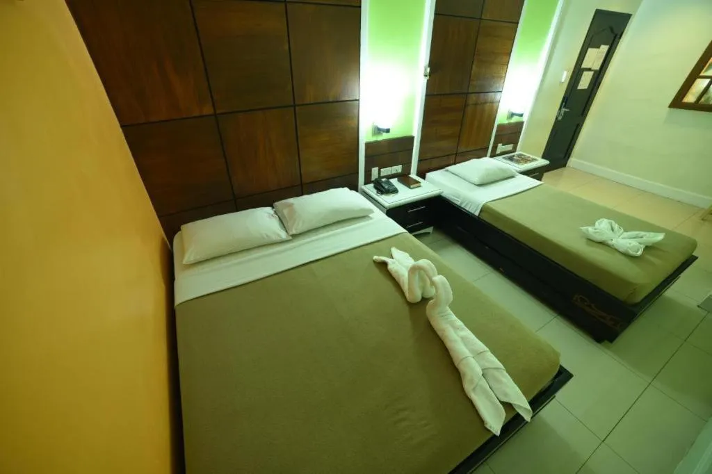 Bed in Marcian Business Hotel