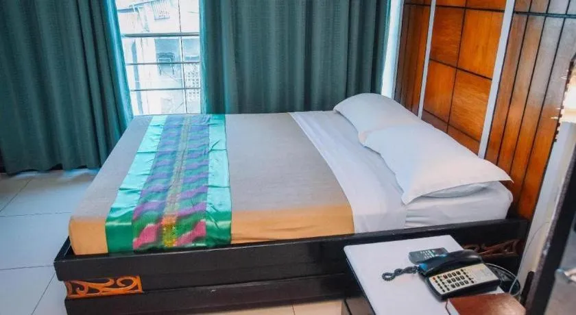 Bed in Marcian Business Hotel
