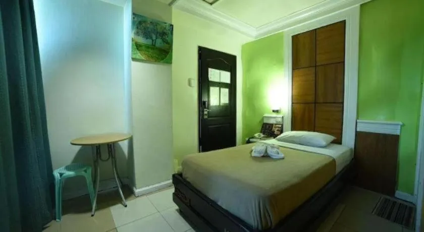 Bed in Marcian Business Hotel