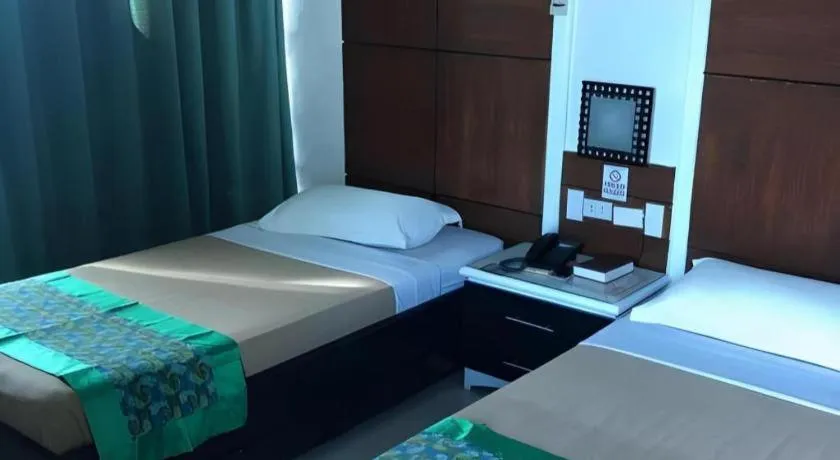 Bed in Marcian Business Hotel