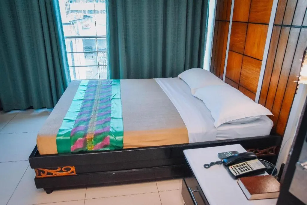 Bed in Marcian Business Hotel