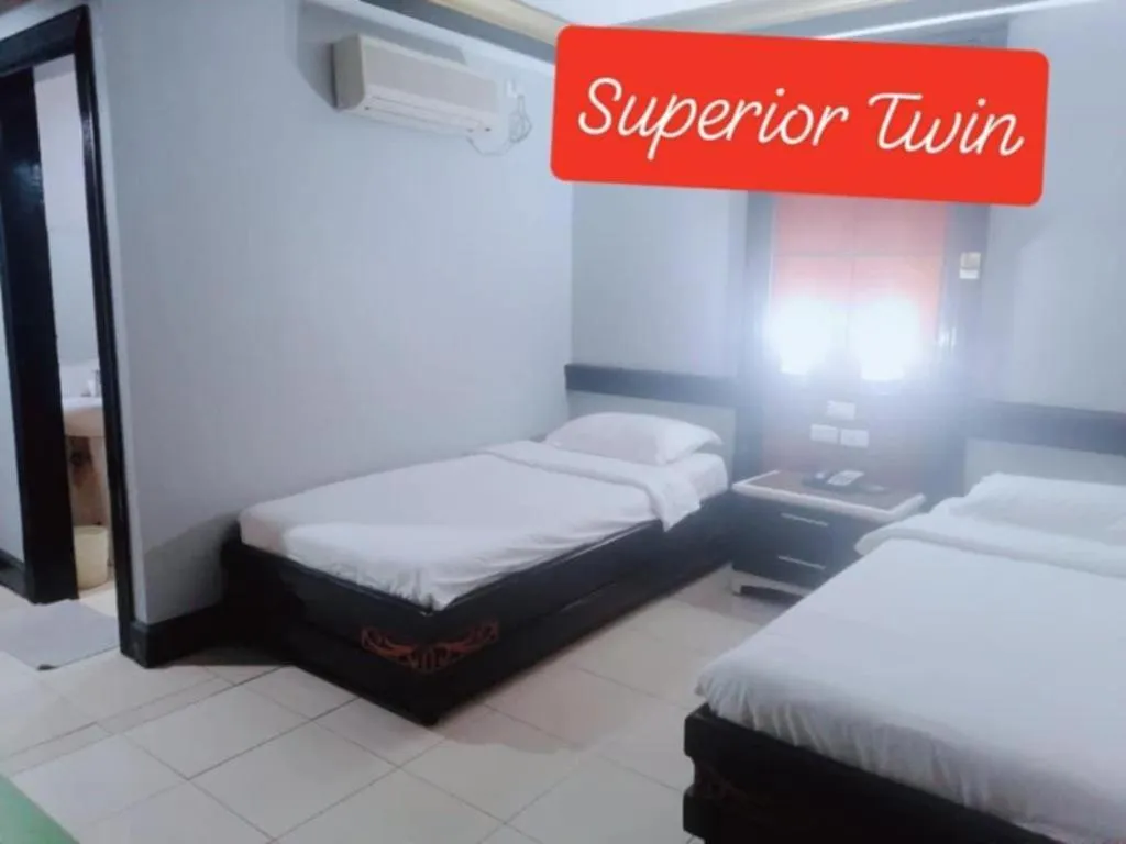 Bed in Marcian Business Hotel