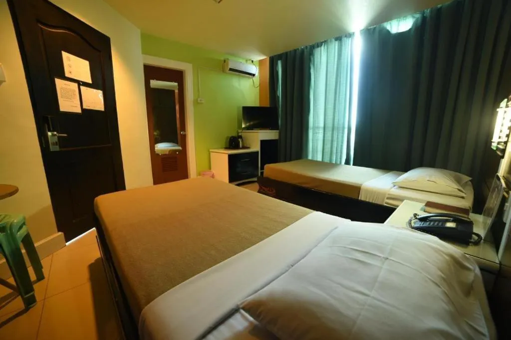 Bed in Marcian Business Hotel