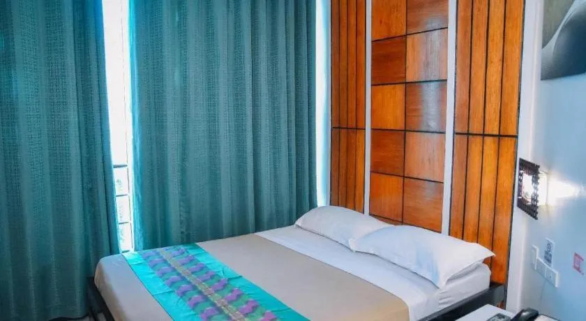 Bed in Marcian Business Hotel