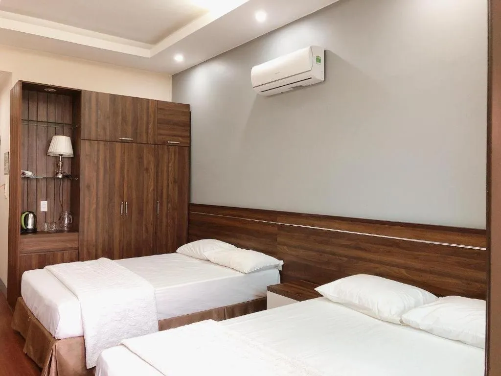 Bed in Hon Ngu Hotel Cua Lo Beach
