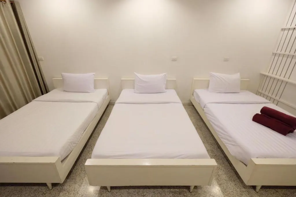 Bed in Chiang Rai Hotel