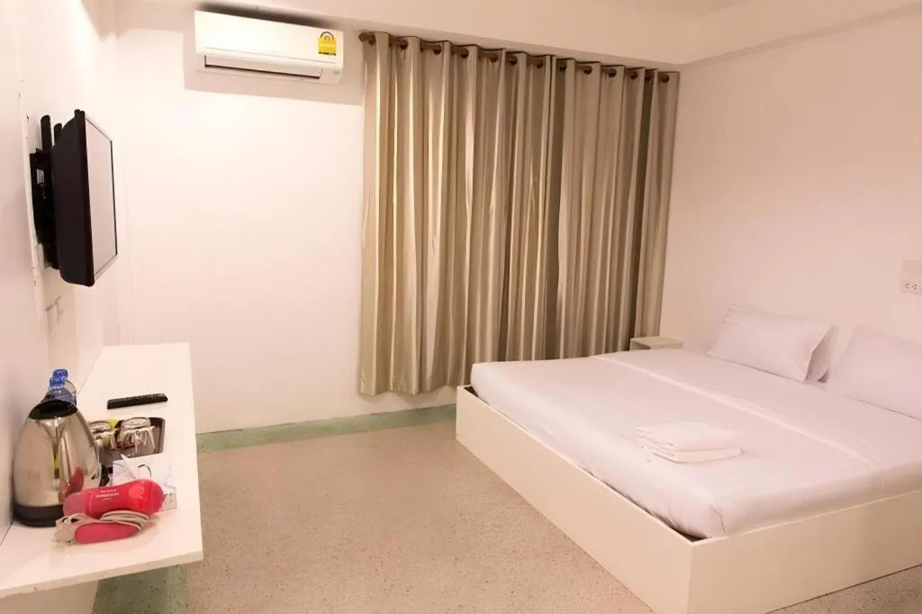 Bed in Chiang Rai Hotel