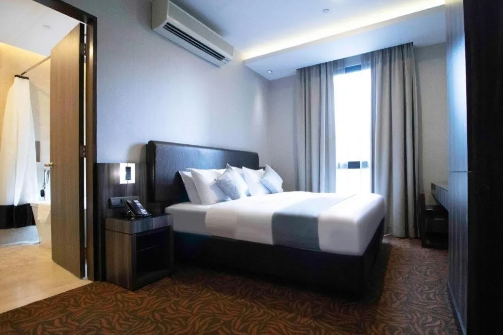 Bed in Hotel NuVe Stellar