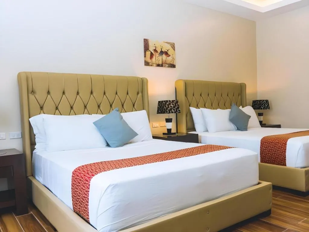 Bed in Primus Hotel and Resort