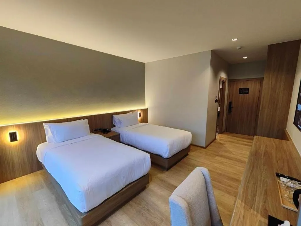 Bed in Butterfly Hotel Betong