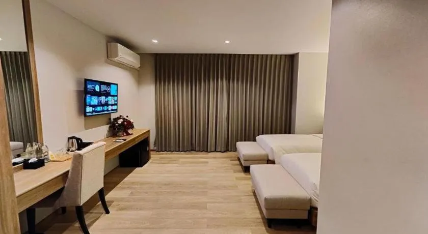 Bed in Butterfly Hotel Betong