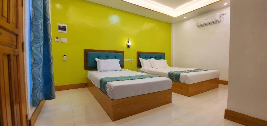 Bed in Alona Mariners Resort