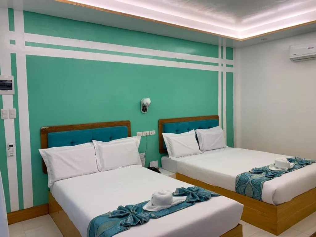 Bed in Alona Mariners Resort
