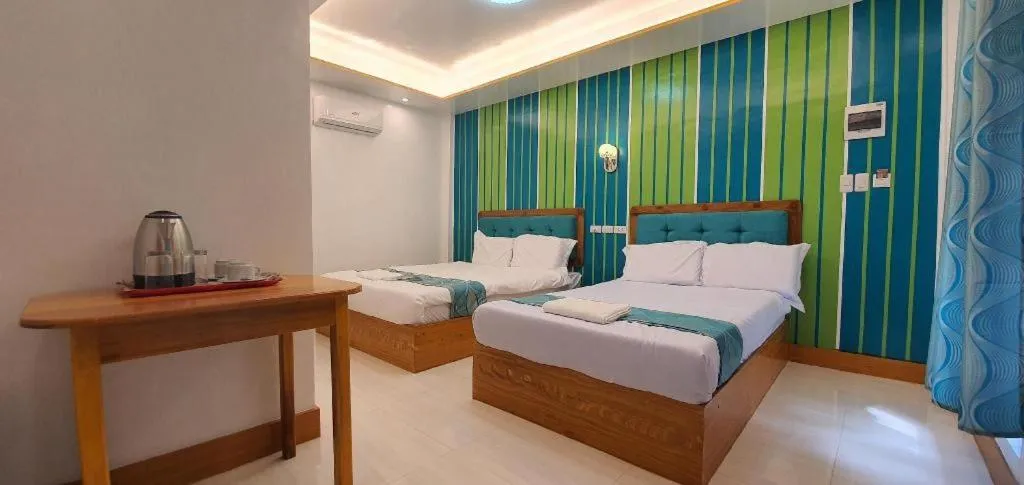 Bed in Alona Mariners Resort