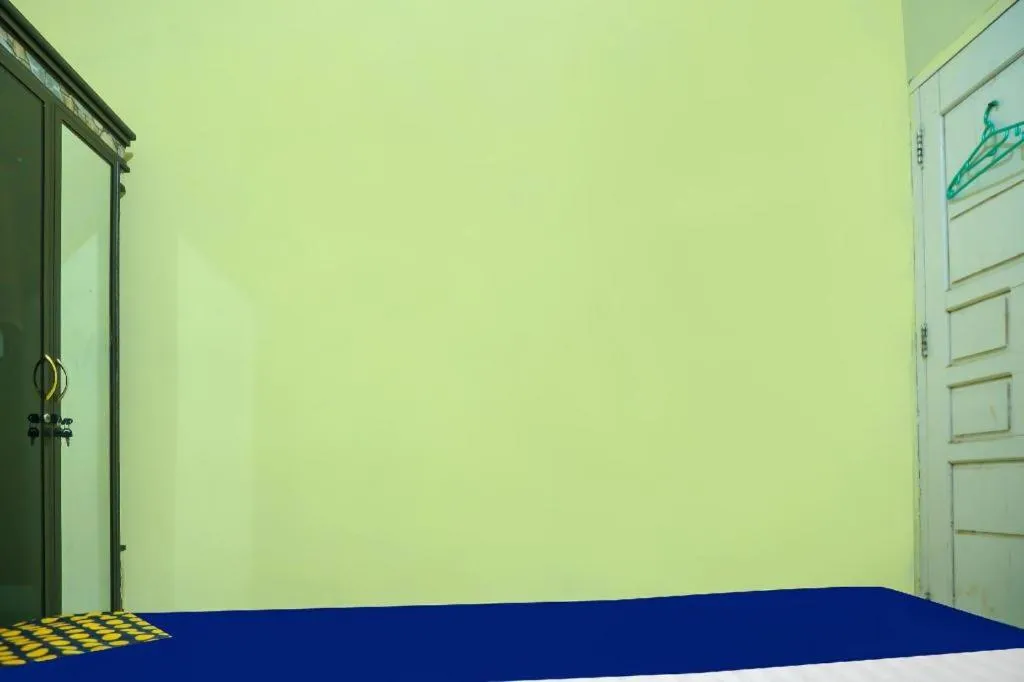 Bed in Hotel O Kost Qiu Qiu 99