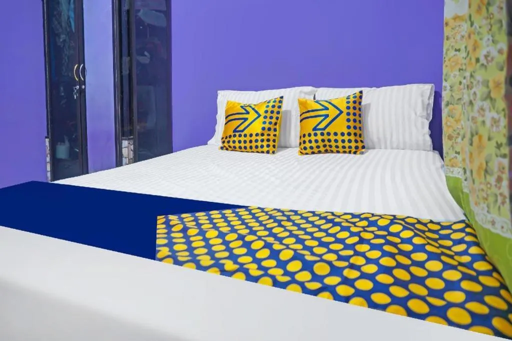 Bed in Hotel O Kost Qiu Qiu 99