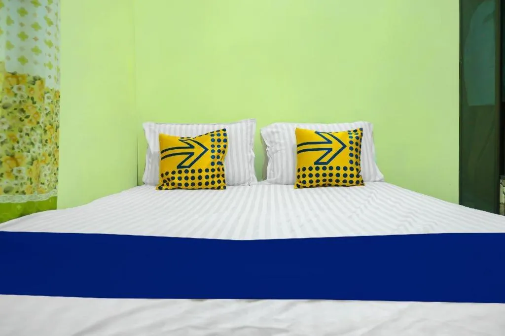 Bed in Hotel O Kost Qiu Qiu 99